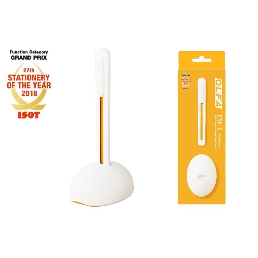 suport alb sferic cu un cutter alb langa ambalajul sau de carton galben